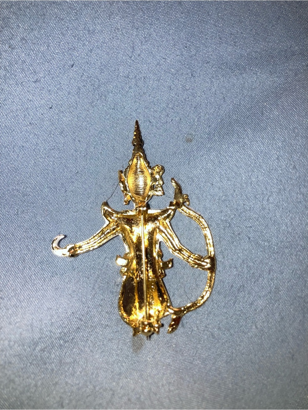 Ramayana bow character
Thai-style Enamel Archer Brooch in White, Red & Gold - Picture 3 of 3